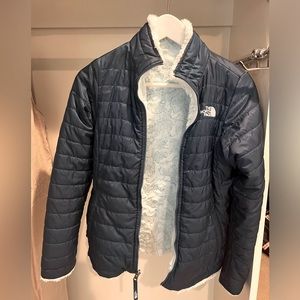 Girl’s North Face reversible blue/ light blue jacket. Size L.